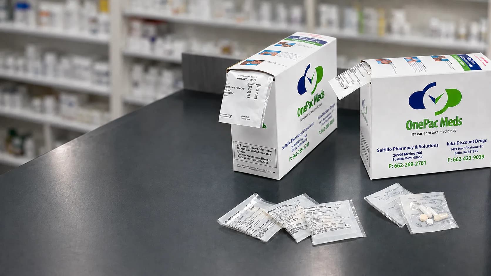 OnePac Meds multi-dose medication packets on the pharmacy counter